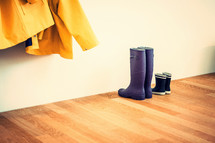 rain boots in a mudroom 