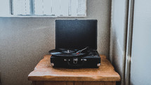 record player on a wood table 
