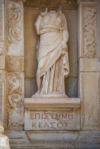Roman statue and writings 