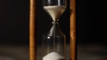 The sands of time in a hourglass