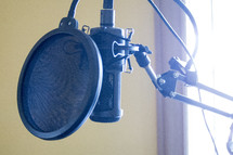 a microphone in a studio 