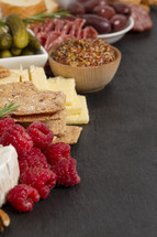 Charcuterie board with snacking food