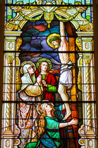 stained glass window of the crucifixion 
