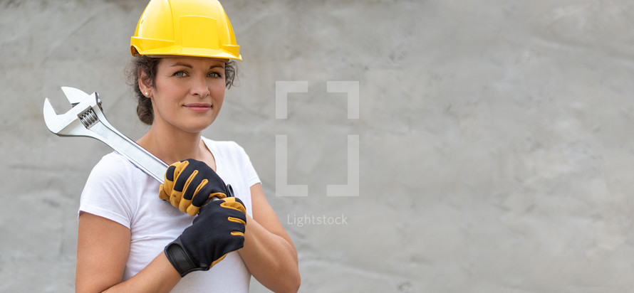 Woman work power. Portrait of female worker. Authentic close-up shot. Labor day.