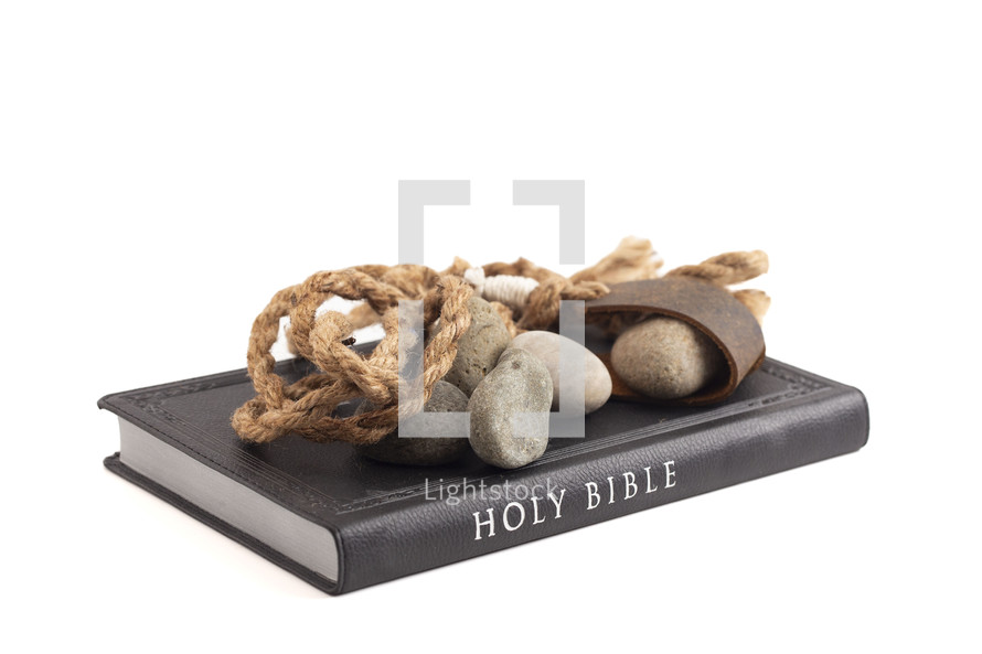 A Sling Shot and Stones Isolated on a White Background from the Story of David and Goliath in the BIble 