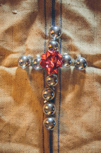cross of Christmas ornament balls 