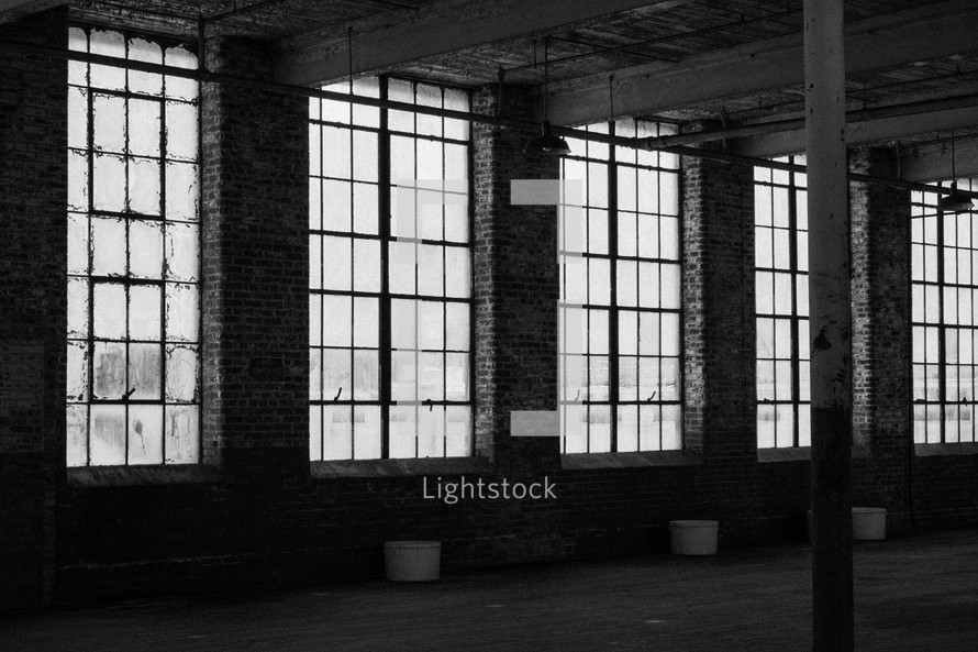 sunlight through windows in a warehouse 