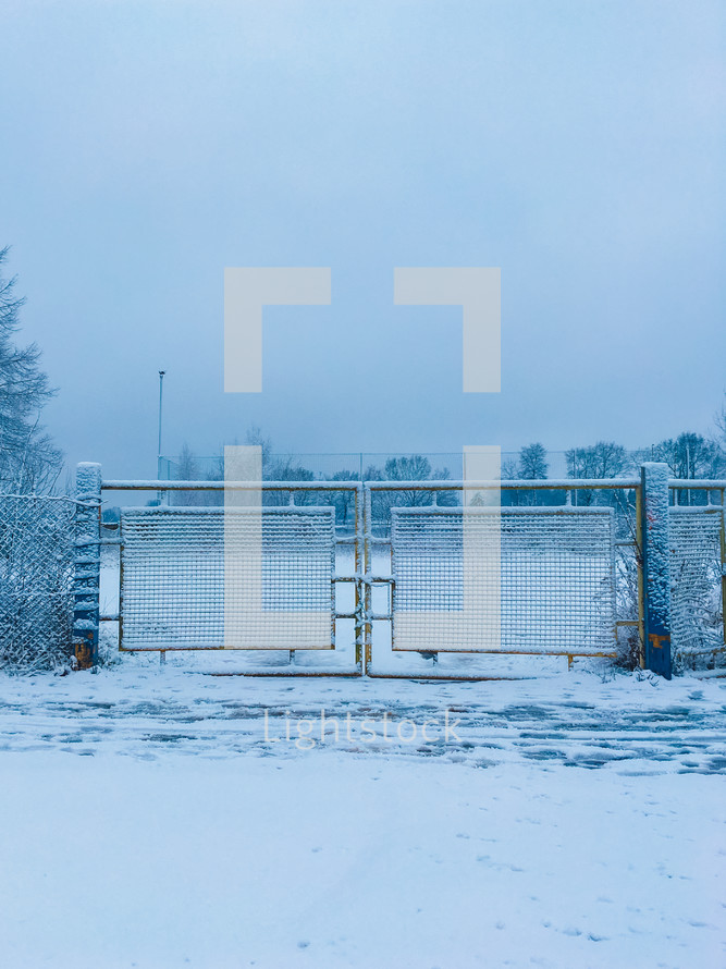 gate and snow 