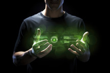 Close up of man holding holographic tablet pc with media screen on dark background with a cross