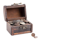 A treasure chest of Ancient Roman Coin Replicas Isolated on a White Background
