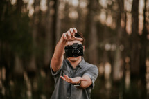 a man catching a camera 