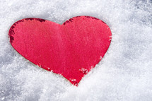 wood red heart in snow 