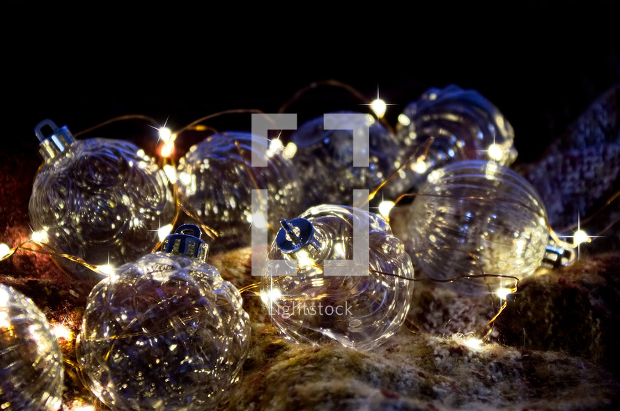 clear glass ornaments and fairy lights 