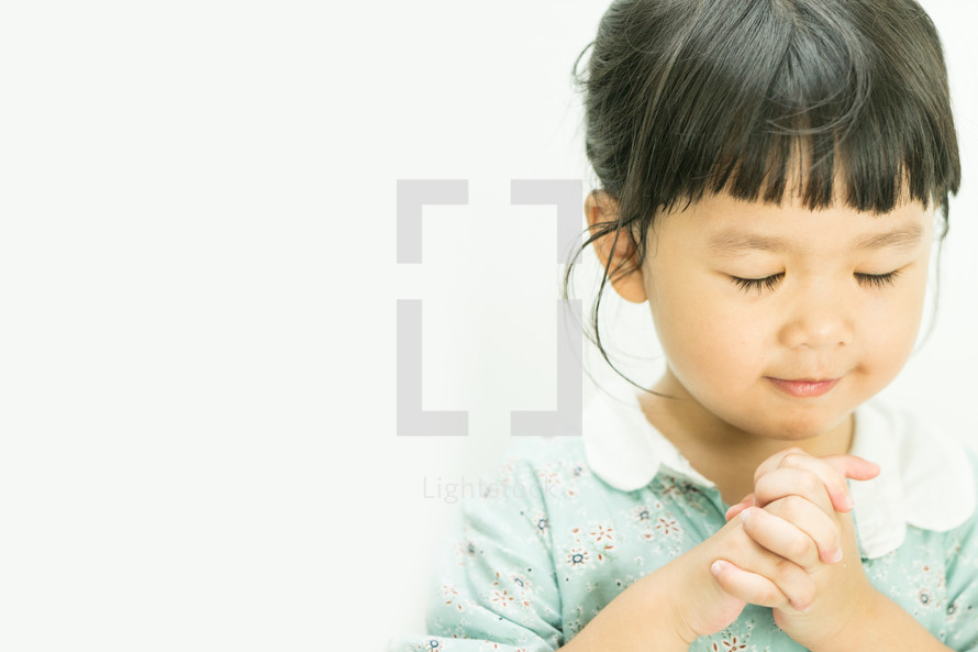 a praying child 