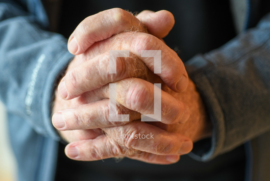 elderly praying hands 