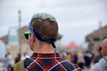 a young man with blue hair stylish trendy haircut 
