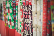 rolls of Christmas wrapping paper 