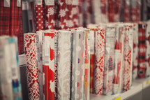 rolls of Christmas wrapping paper 