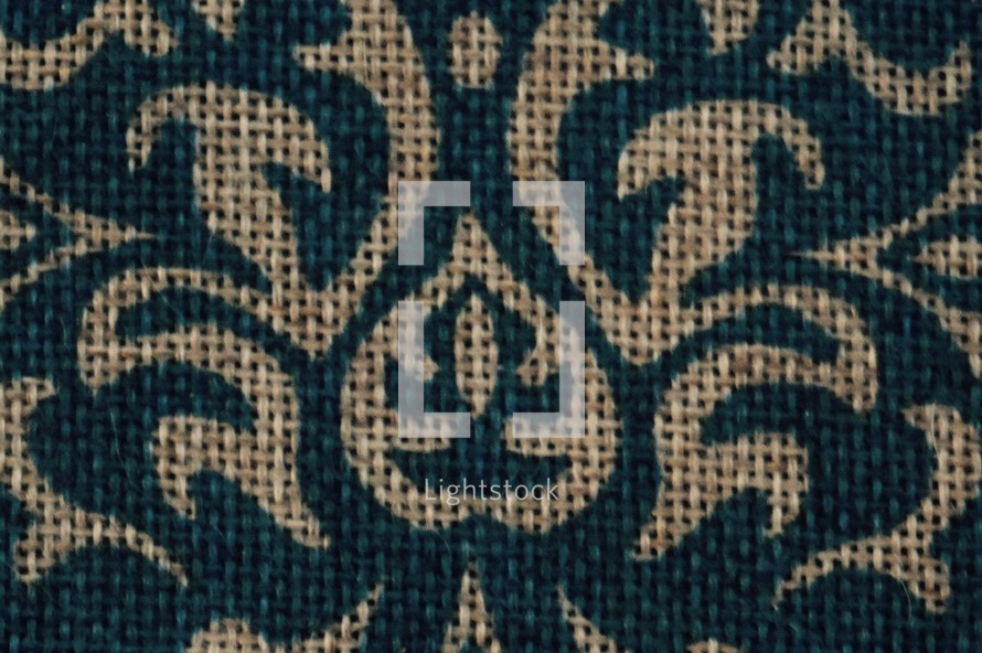 patterned woven fabric texture background in blue and beige