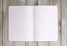 blank paper in an open notebook 