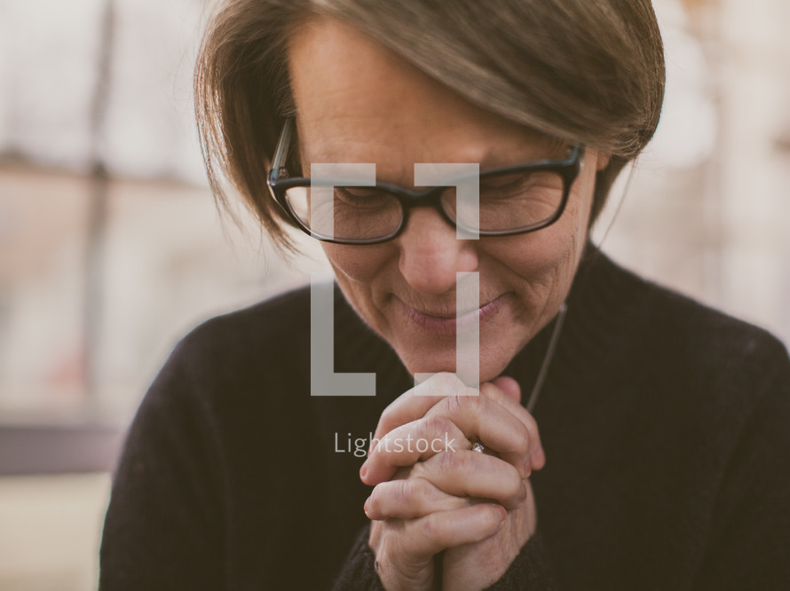 Woman praying.