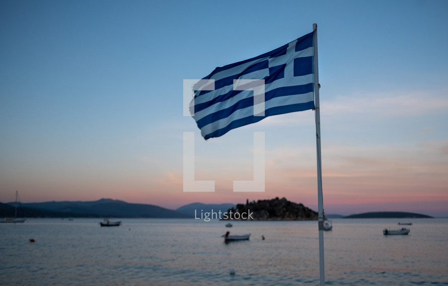 Greek Flag and bay view 