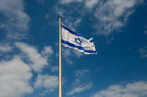 Israeli flag on a flagpole 