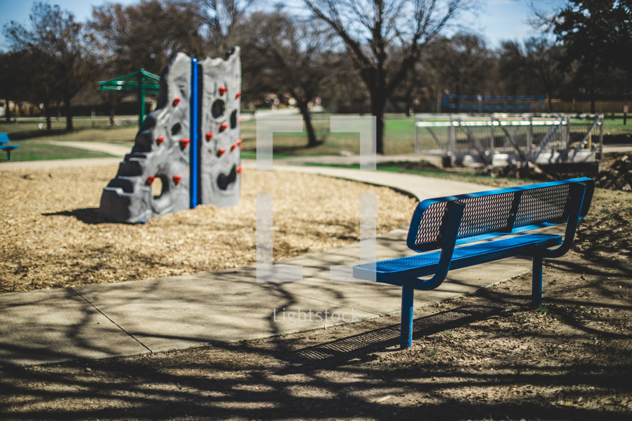 park bench at a playground 