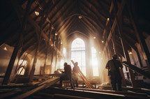 Building for Jesus. Three men working on the interior of a new church