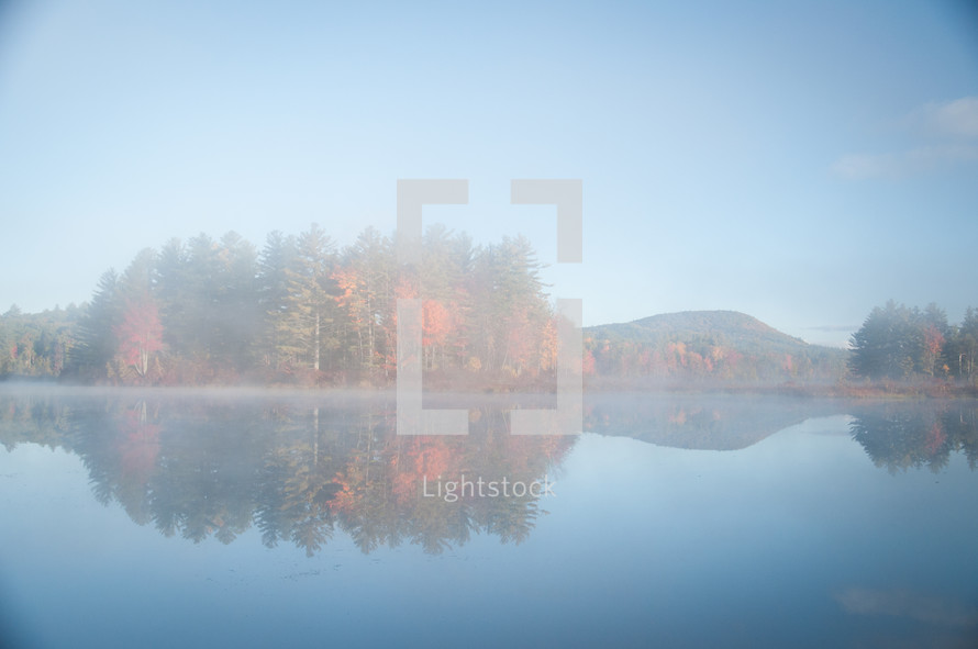 fog and mist around a lake 