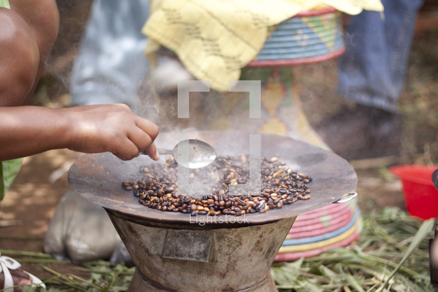 coffee beans roasting outdoors 