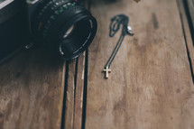 camera and cross necklace 