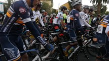 Bike riders head to the starting line at a bicycle race