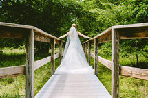 bride on a foot bridge 