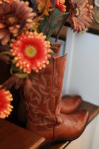 gerber daisies in cowboy boots 