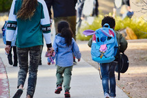 family walking to school 