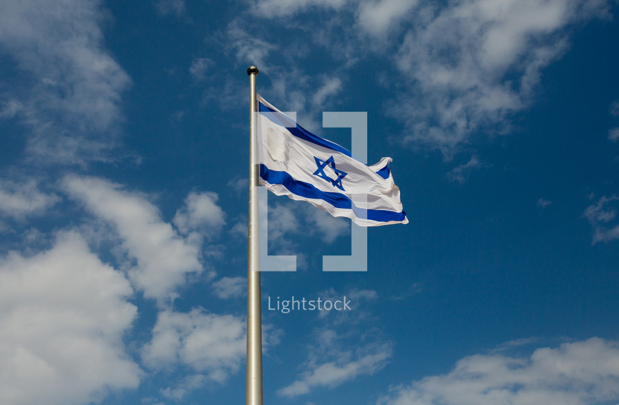 Israeli flag on a flagpole 
