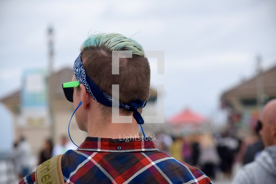 a young man with blue hair stylish trendy haircut 