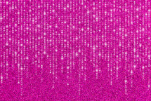 streamers on pink glitter background 