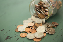 spilt jar of coins 