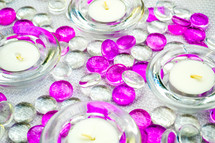 tea candles and glass marbles 