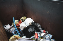 trash in a dumpster 