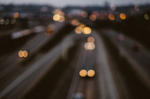 Bokeh - headlights from moving cars on a highway. 