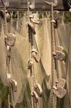 A fishing net hanging to dry 