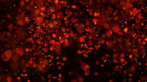 Sparkles in water. Red glitter paint in water, abstract cloud formations on black background. Can be used as gloss transitions, added to art modern projects. Slow motion