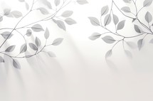 White leaves on white background with copy space for text or image.
