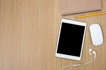 iPad, earbuds, mouse, pencil, notebook 