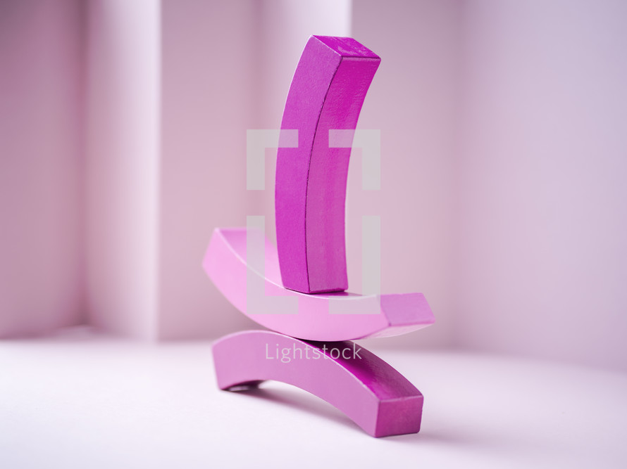pink blocks in abstract shapes 