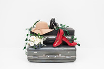 red high heels, flowers, sunhat, camera, suitcases, white background, travel, trip, luggage, vacation