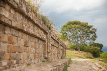 A stone wall in the countryside.